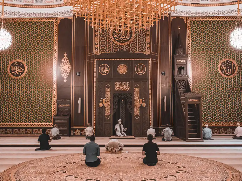 Boy reading Quran